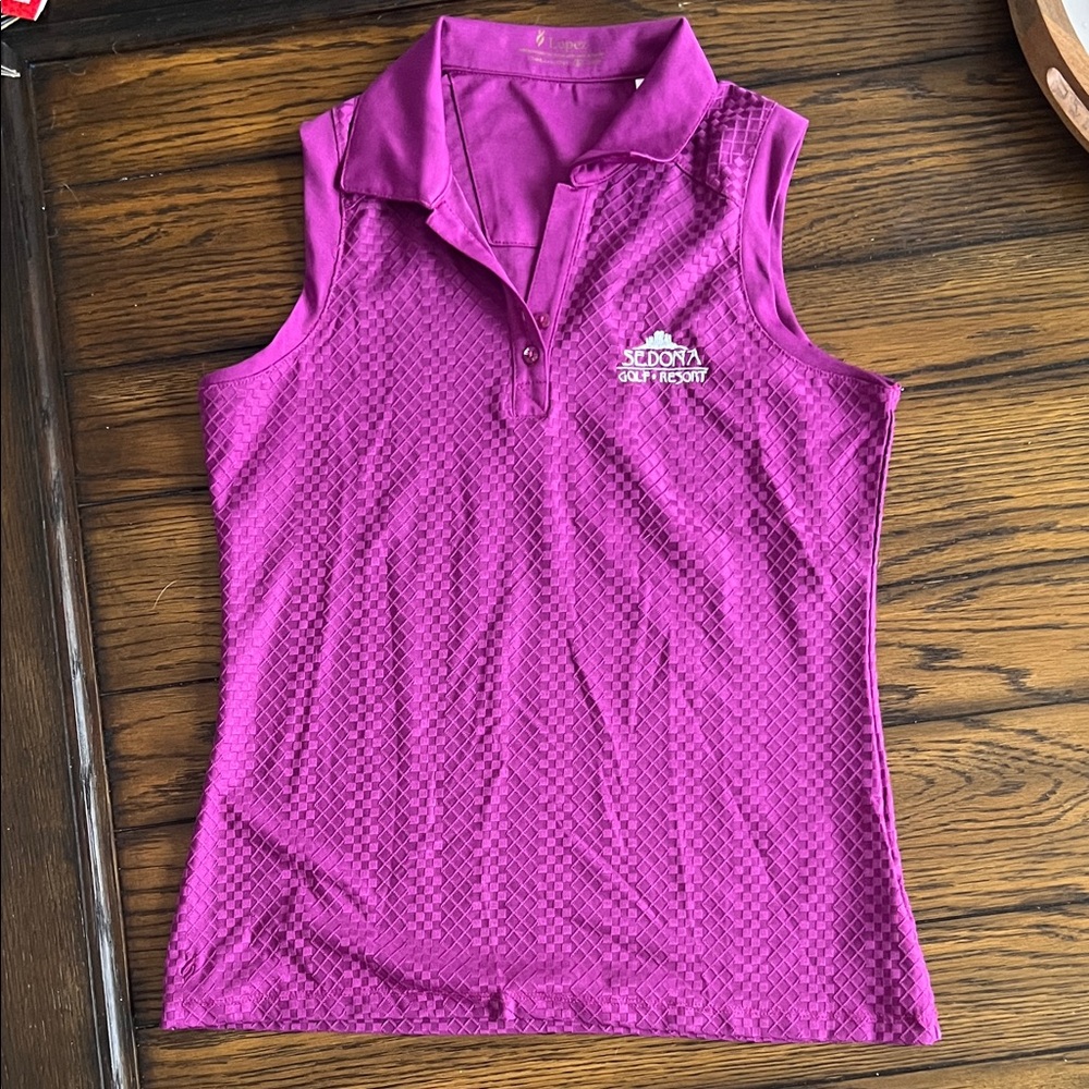 Women’s Lopez magenta sleeveless golf shirt Small